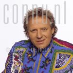 20-02-1994 Koos Alberts at studio Amsterdam

[keywords]Headshot, Eyecontact, Posed, Smiling, Singer[/keywords]